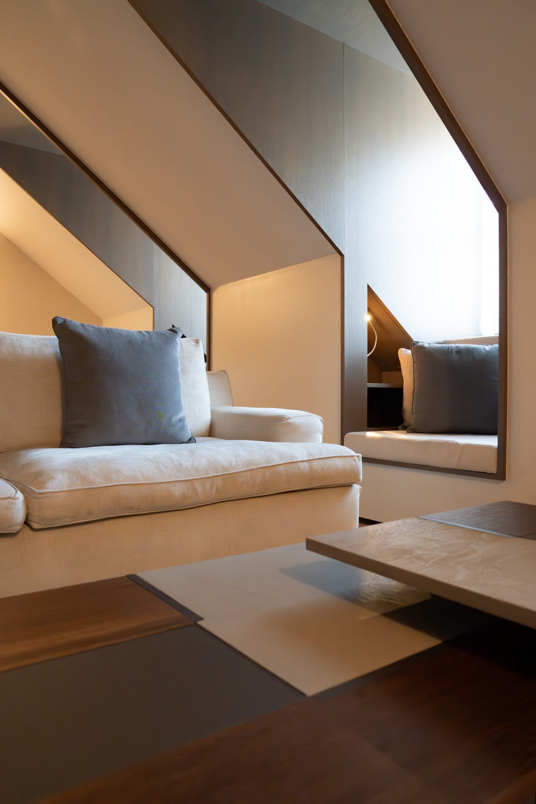 Morning light on the parquet floor of an apartment at Relais Louvigny.